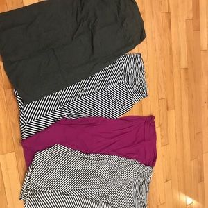 Four maternity skirts